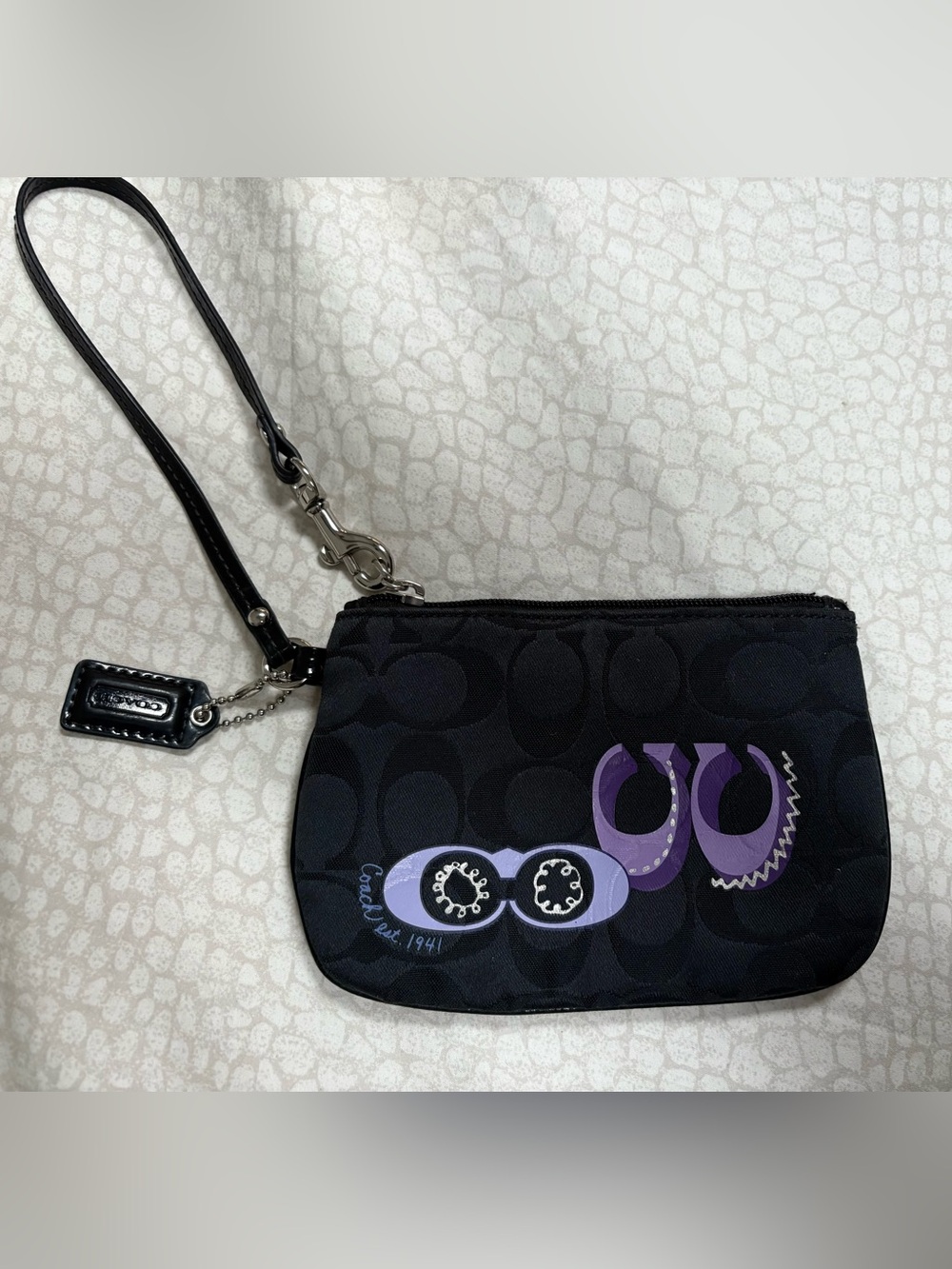 Like New❗️Coach Black Monogram Wristlet with Purple Graphic Accents